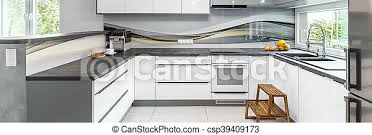 By using the compact wall splashback profile you get the complete interior design answer. Modern Grey Kitchen Panoramic Photo Of Modern And Spacious Kitchen In Grey With White High Gloss Furniture And Window Canstock