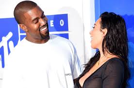 It was all love in the air as the yeezy family rang in a smiling west appears in the background before popping up beside his wife as they embrace in a warm new year's kiss. Kim Kardashian Kanye West Ring In The New Year With A Cute Kiss Watch Billboard