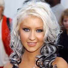 Singer superstar christina aguilera sports a cruella deville meets goldilocks style. Christina Aguilera S Changing Looks Instyle