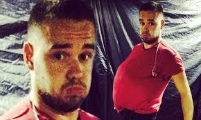 Liam Payne hits back at internet 'fat' jibes with a picture of his inflated  gut