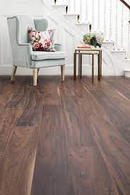 Aqualock 12mm Laminate Flooring Autumn Haze Oak Has A Striking Vintage Look And Features Pla Brown Laminate Flooring Laminate Flooring Colors Laminate Flooring