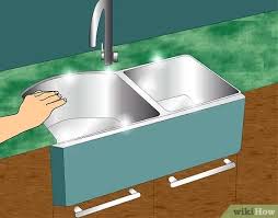 how to caulk the kitchen sink (with