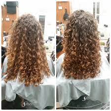 The deva cut focuses on either sculpting each curl by cutting it at an angle so the curl pattern is not disrupted or using a technique of cutting curl by curl. First Deva Cut Curlyhair