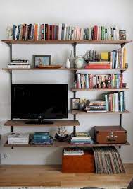30 Stunning Storage Ideas For Small Apartment Spaces Small Apartment Furniture Apartment Bookshelves Small Apartment Storage