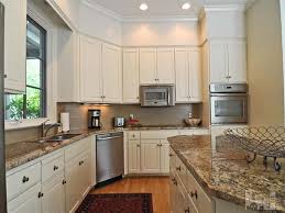 1804 Mews Dr Wilmington Property Listing Mls 492076 Above Kitchen Cabinets Kitchen Living Kitchen Cabinets