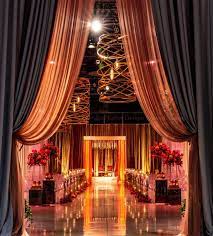 2020 Wedding Trends Transform Your Next Event With Tropical Opulence Asian Wedding Decor South Asian Wedding Decor Indian Wedding Venue