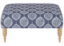 A set of blue ikat chairs face a blue velvet tufted ottoman in a white wainscoted room. Ophelia Co Edmund 36 Wide Tufted Square Ikat Cocktail Ottoman Wayfair