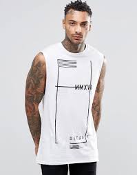 Asos Longline Sleeveless T Shirt With Flag Print At Asos Com Camisetas Masculinas Blog De Moda Masculina Camisas Masculinas