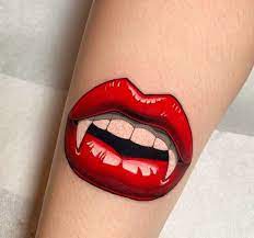 Vampire Lips In 2021 Tattoos Red Lips Tattoo School Tattoo