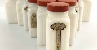 The similarity of the font you can see on the few jars with remaining labels suggests an imitation of wagner's label style. Vintage Spotlight Griffith Milk Glass Spice Jars Dusty Old Thing