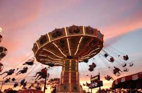 Swings At Adventureland Sunset Island Amusement Park Fair Grounds