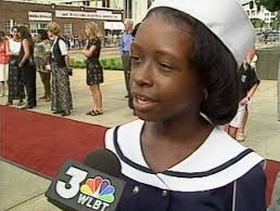 Rae'Ven Larrymore Kelly being interviewed by a WLBT reporter in Jackson  while she was in town for the premiere of A Time to Kill