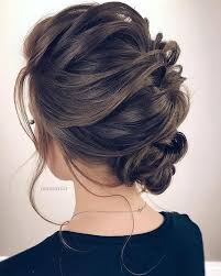 If you're going for a traditional look for your wedding reception there's probably no better hairstyle than a floral bun. 100 Gorgeous Wedding Hair From Ceremony To Reception