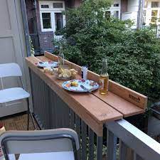 14 Functional Tiny Apartment Balconies The Family Handyman Small Apartment Patio Small Balcony Design Balcony Decor
