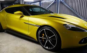 Image result for Cosmopolitan Yellow 2023 Aston Martin
