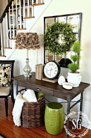 Home Decorating Ideas Entry Foyer Under The Stairs With A Console Table And Fresh Spring Green Colors Home Decor Entry Decor Decor