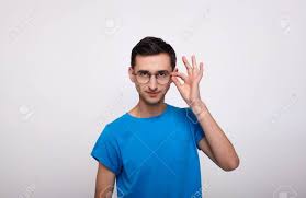 Saw this white guy in orange mound and had to grab a photo! A Young Charming Gentle White Guy In A Blue T Shirt Poses In Stock Photo Picture And Royalty Free Image Image 137828328