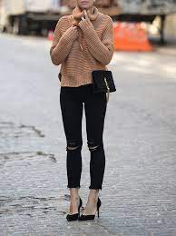 Camel sweaters first appeared on chictopia's streetstyle gallery in fall 2010 seen on montreal blogger lanton of qualityrivets.blogspot.com. Helena Glazer Wears A Pair Of Distressed Black Jeans With A Knitted Camel Pullover Coat Vince Sweater C Meo Jeans Express Shoes Marc Fisher Just The Design