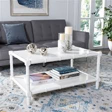 They are made of natural elements such as weathered driftwood, reclaimed. Safavieh Noam Modern Coastal Rectangular Coffee Table White Lowe S Canada