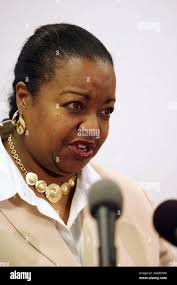 Wayne County Prosecutor Kym Worthy, center, stands with assistant  prosecutors and addresses the media after ex-mayoral aide Christine Beatty  was sentenced to jail in Detroit, Tuesday, Jan. 6, 2009. From left are