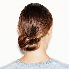 The side cut braid and the low bun presents. 5 Low Bun Hairstyles We Love