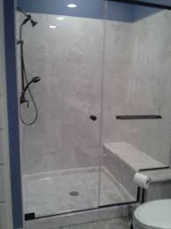 In Your Remodel Or New Construction When It Comes To Choosing Shower Material Think Cultured M Simple Bathroom Renovation Marble Shower Walls Shower Remodel