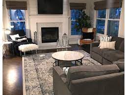 We really don't have much light in that room to start with, and since it's a sectional, of course there's no end table or lamp. Arc Lamp Over Sectional Or More Traditional Floor Lamp