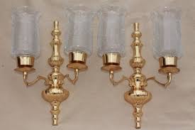 Decorate your walls with this antique brass flameless candle wall sconce. Vintage Polished Brass Candle Sconces Wall Sconce Set W Crackle Glass Hurricane Shades