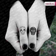 Black And White Sugar Skull Tattoo Small Sugar Skulls Very Cute I Love The Black And White That I Must Do Somewhere But Bigger Tattoos Sugar Skull Tattoos Finger Tattoos