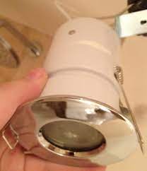I've moved into a new house that has a couple of square recessed lights. How Do I Replace A Broken Halogen Bulb In The Recessed Light In My Bathroom Home Improvement Stack Exchange