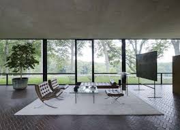 Outdoor glass tables and chair sets. 14 Lessons In Minimalism From The Glass House Remodelista