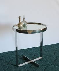 Maybe you would like to learn more about one of these? Small Round Chrome End Table With Mirror Top