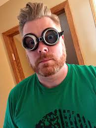 3) pairs of protective safety glasses. New, in original packaging.