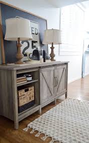 A patterned rug, tufted sofa and coffee table define the space. Better Homes Gardens Modern Farmhouse Tv Stand For Tvs Up To 70 Rustic Gray Finish Walmart Com Furniture Interior Barn Doors Farmhouse Style Kitchen
