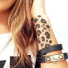 Cheetah paw print tattoo on side rib. 99 Marvelous Small Tattoo Design Ideas Cheetah Print Tattoos Leopard Print Tattoos Leopard Tattoos