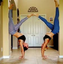 On Door Frames With That Handstand We Learned In Level 2 Partner Yoga Poses Partner Yoga Beach Yoga Photography