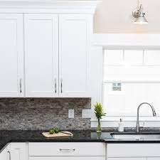 White shaker kitchen cabinets white kitchen appliances kitchen counters black countertops product features: How To Choose Kitchen Cabinet Hardware Family Handyman