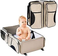 A baby lying on an elevated mattress in an infant bed with traditional crib bumpers placing a child into an infant bed can put strain on a caretaker's back as they typically have a mass between 11.8 kilograms (26 lb) 15 and 16.8 kilograms (37 lb) 16 at 36 months of age. Portable Baby Bed Infant Travel Bed 3 In 1 Multi Functional Folding Bag Portable Bassinet Crib Gift For Traveling Buy Online At Best Price In Uae Amazon Ae