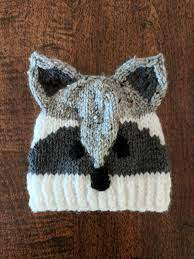 This little enotik growth of 10 cm, stand alone. Raccoon Knit Hat Knitting