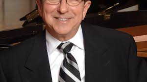 LIVES WELL LIVED: Al Rinaldi, panhandler to piano man