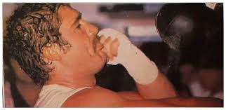 The photo with Gerrie Coetzee wearing the Old Buck Belt Is a very rare  picture not often seen. The Pic