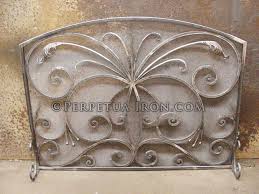 Forged fire place doors by neil suttons forged iron standing fireplace screen by kim and ann pahlas $1800+ hand forged fireplace screens by demejico inc. Perpetua Iron Firescreens