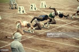bob hayes of united states competes in the men s 100m heat at the national stadium during the tokyo olympic on tokyo olympic american athletes national stadium