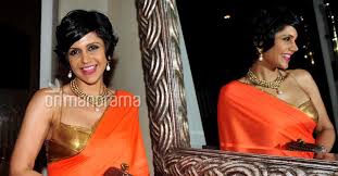 A saree draped in 1. Mandira Bedi Launches New Saree Collection