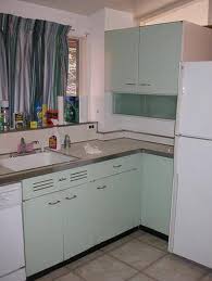 How To Refinish Metal Kitchen Cabinets Hunker Metal Kitchen Cabinets Vintage Kitchen Cabinets Metal Kitchen