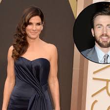 During a recent interview, chris evans allowed the top of his chest tattoos to peek out from his shirt and the internet could not handle it. Sandra Bullock Romanze Mit Chris Evans Bunte De