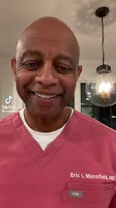 Eric L Mansfield