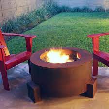 A fire that is impinging on the propane tank will eventually explode badly. Hidden Propane Tank Fire Pit Ideas Photos Houzz