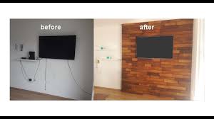 While it's against electrical code to run your. How To Hide Tv Equipment And Cables Cheap Solution Tv Wall Idea Tv Panel Idea Used Wood Panels Youtube