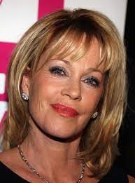 Older woman with dark hair. Hairstyles For 55 Year Old Woman Hairstyles Weddinghairvintage Medium Hair Styles Medium Length Hair Styles Medium Length Hair With Bangs